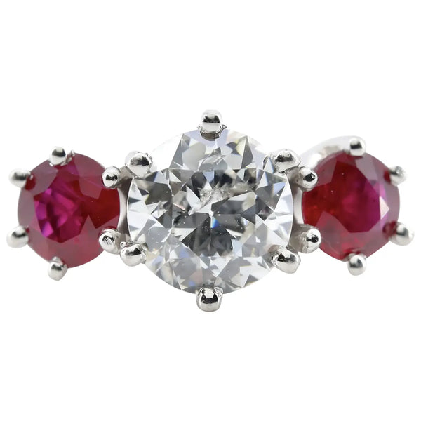 Edwardian 2.28ctw Diamond & Ruby Three Stone Engagement Ring in Platinum