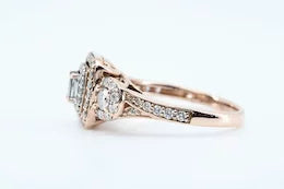 Graceful 1.00ctw Three Stone Diamond Halo Ring in 14K Rose Gold